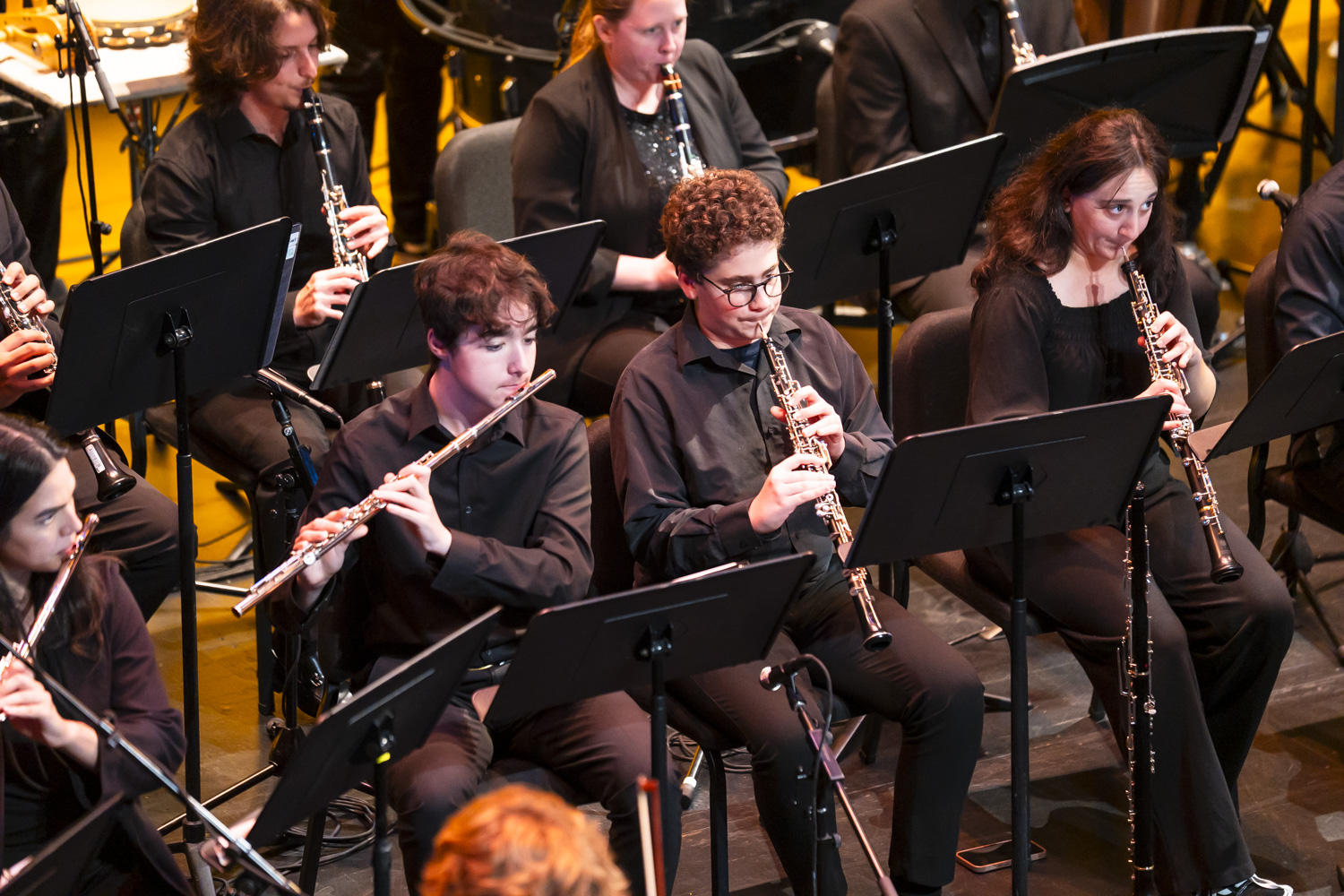 NXT woodwinds section performing on stage