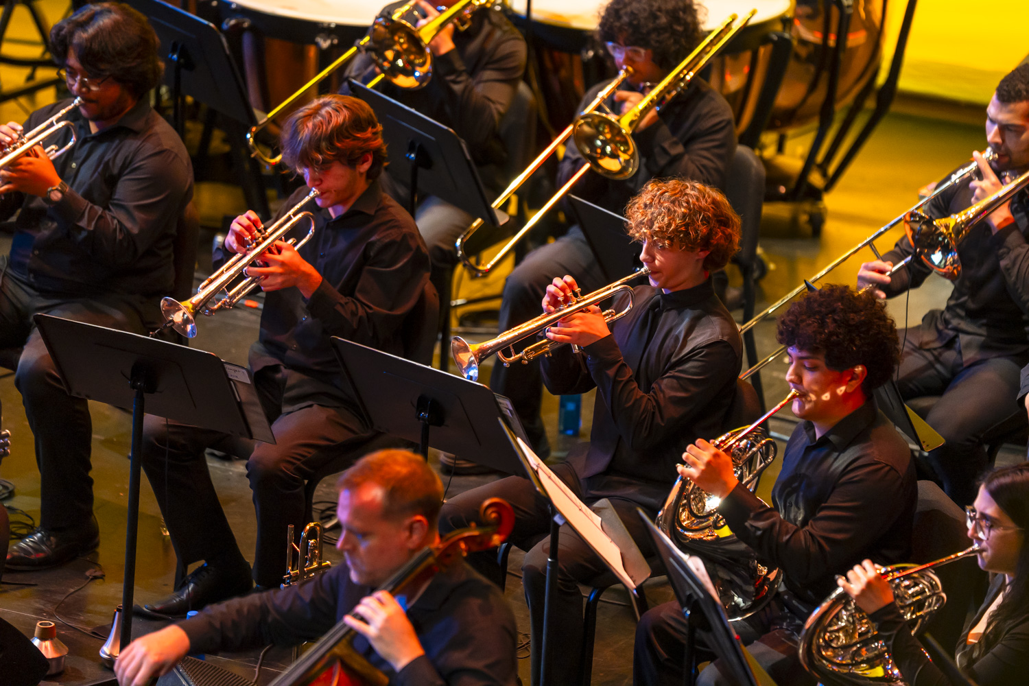 NXT brass section performing on stage