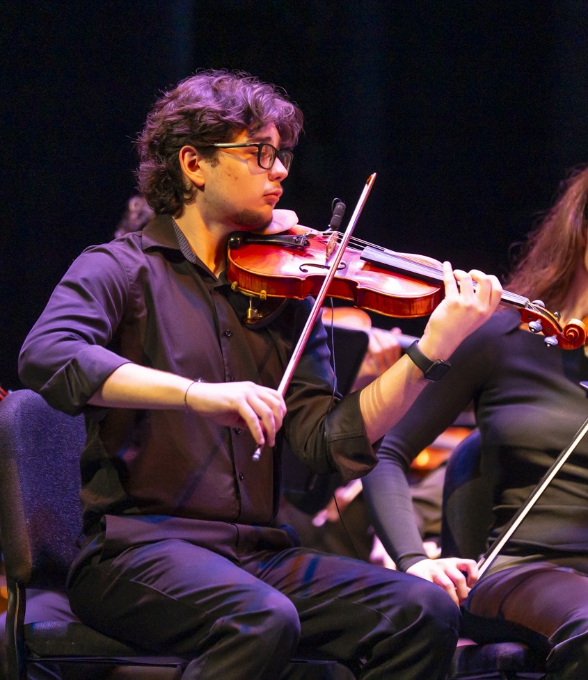 NXT Concertmaster Arturo Estevez performing on violin