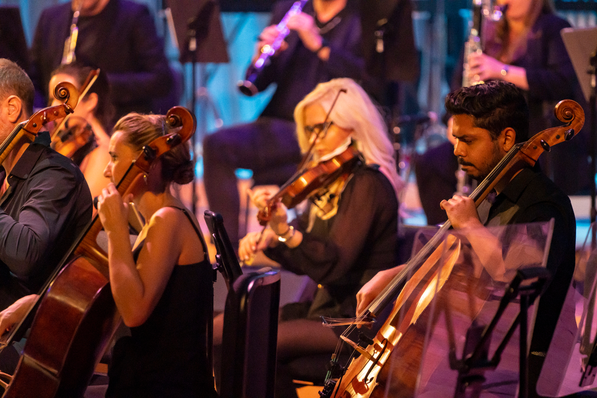 Nu Deco Ensemble strings section performing during the Allen Stone and Derrick Hodge concert, April 2023